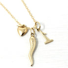 Vintage Charm Necklace - Retro 14k Yellow Gold Cornicello Number 1 Heart Pendants Trio - Circa 1990s Era Personal Fine Italian Horn Jewelry