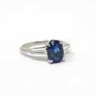Sapphire & Diamond Ring - Estate Platinum Natural Blue Oval Gemstone And Baguette Diamond Engagement - Modern Era 2000s Era Fine Jewelry