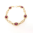 Rhodolite Garnet Bracelet - Modern Estate 14k Yellow Gold Purple Red Oval Faceted Natural Gemstones - Circa 2000s Era Love Knot Fine Jewelry