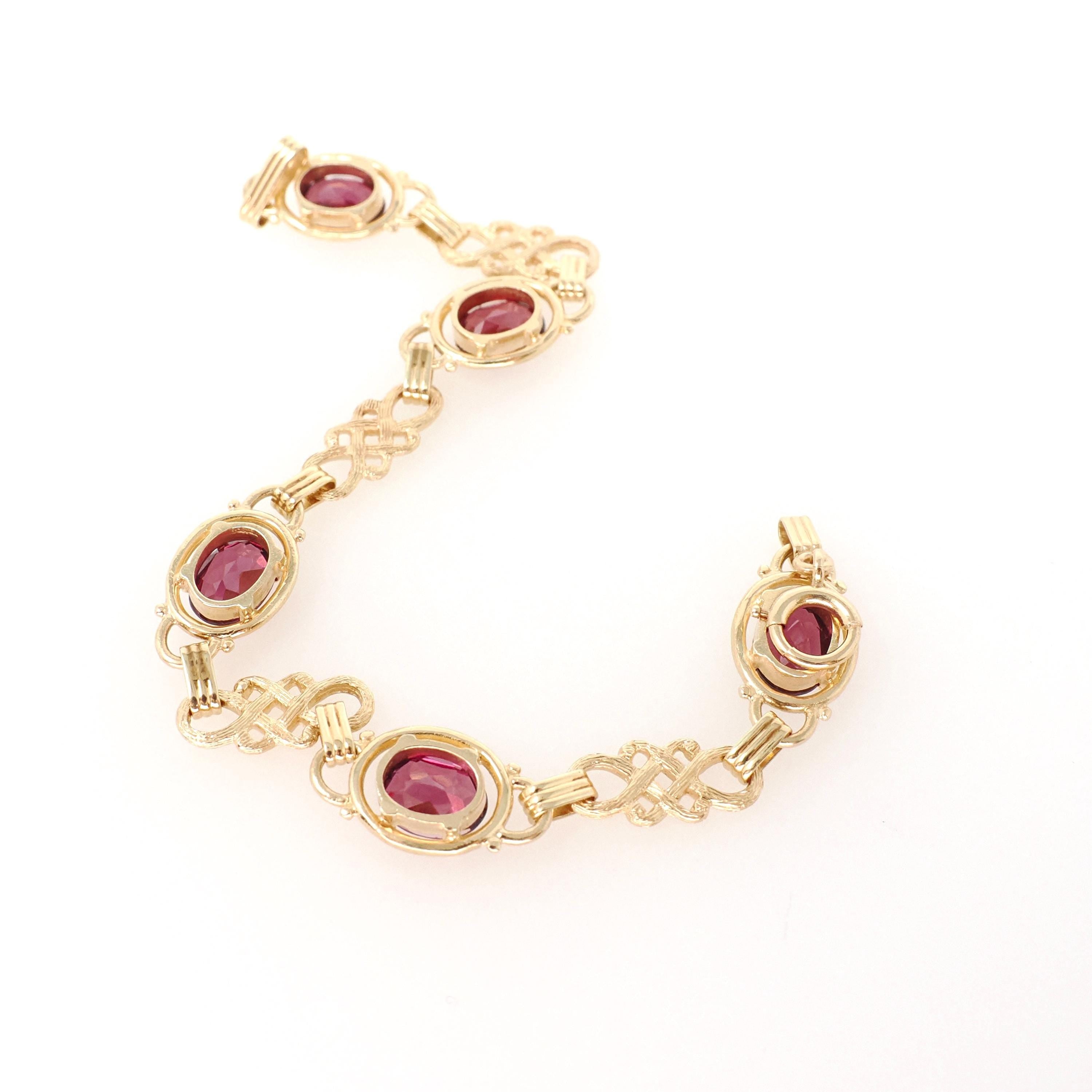 Rhodolite Garnet Bracelet - Modern Estate 14k Yellow Gold Purple Red Oval Faceted Natural Gemstones - Circa 2000s Era Love Knot Fine Jewelry