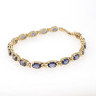 Iolite Tennis Bracelet - Contemporary 14k Yellow Gold Violet Blue Oval Natural Gemstone & Flower Links - Circa 2000s Era 7 1/4" Fine Jewelry