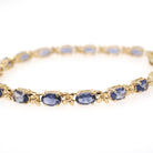 Iolite Tennis Bracelet - Contemporary 14k Yellow Gold Violet Blue Oval Natural Gemstone & Flower Links - Circa 2000s Era 7 1/4" Fine Jewelry