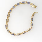Iolite Tennis Bracelet - Contemporary 14k Yellow Gold Violet Blue Oval Natural Gemstone & Flower Links - Circa 2000s Era 7 1/4" Fine Jewelry