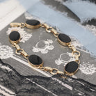 Simulated Onyx Bracelet - Mid Century 12k Gold Filled Oval Black Glass Stones - Circa 1960s Era 7 1/4 Inches Statement Accessory 60s Jewelry